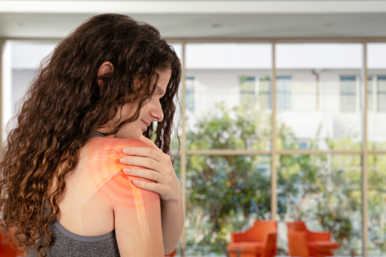 Woman with shoulder pain needing stability treatment therapy