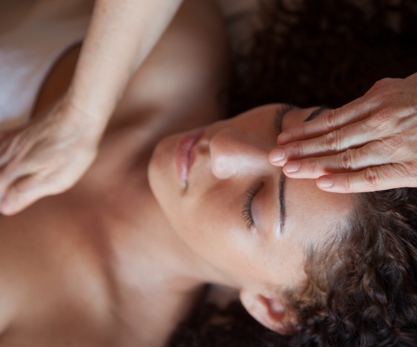 Relaxing facial therapy session promoting circulation and healing